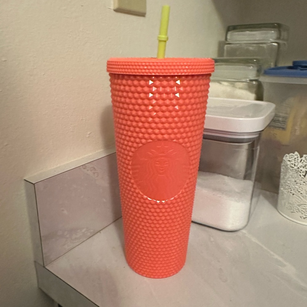 Venti coral studded Starbucks cup